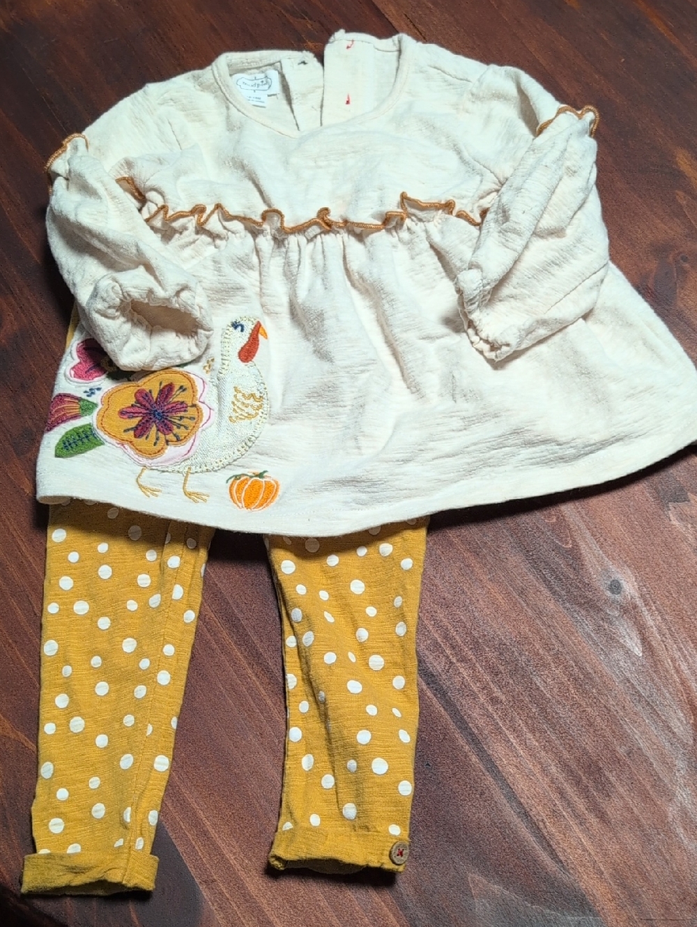 Mud Pie Cream Top with Mustard Polka Dot Backing